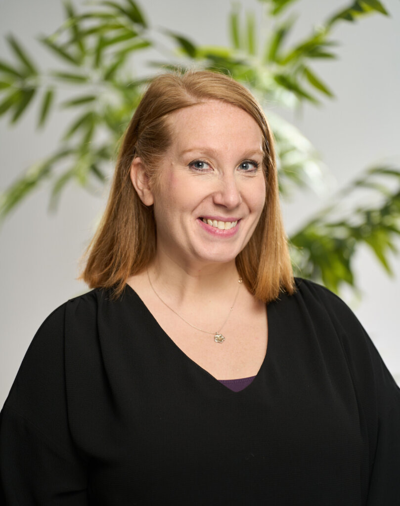 A headshot of Kim Gunson smiling