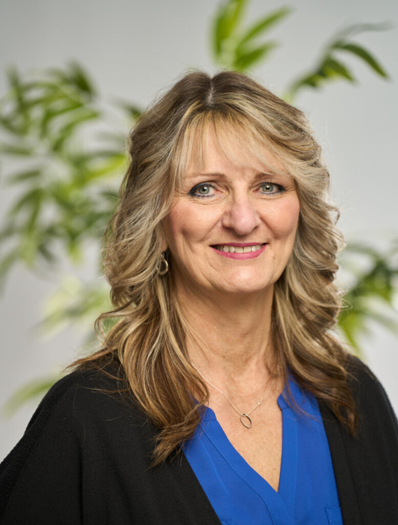 A headshot of Wendy Halliday smiling