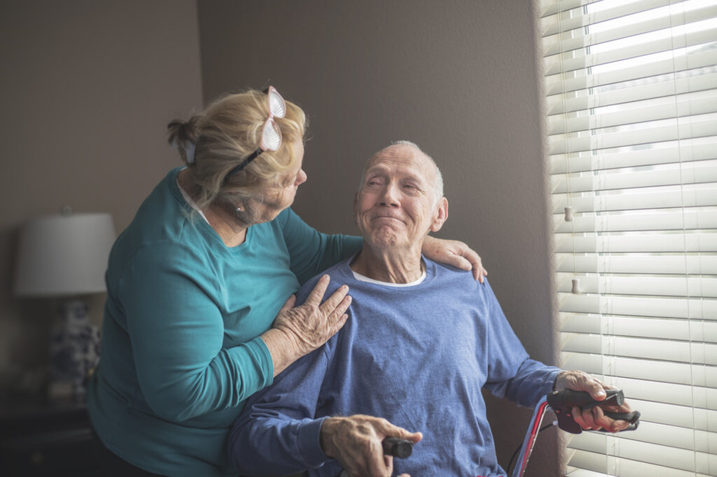 Woman caring for husband at home